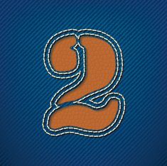 Number 2 made from leather on jeans background