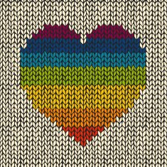Seamless background with rainbow knitted heart