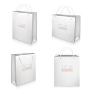 Set of blank white shopping bags isolated on background