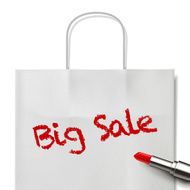 big sale words written by red lipstick