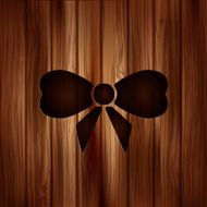 Gift Christmas bow web icon Wooden background