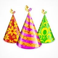 Three party hats on white