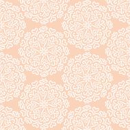 Elaborate hand-drawn white pattern on pink background