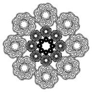 Elaborate circular black and white ornament