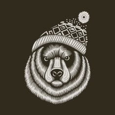 Bear hipster in knitted hat with jacquard pattern