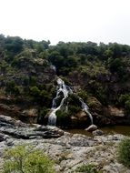 Landscape with the waterfall of the stream