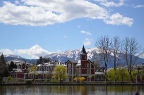 Amazing building in river bank mountain view