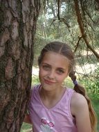 girl by the fir tree