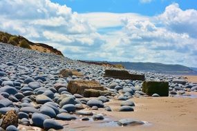 Stones on beach sea sin sand vacation