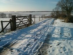 gates on a snowy field