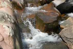 spring among large stones