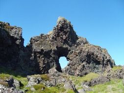 landscape of lava rock in Iceland on a hill