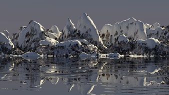 mountains in the snow near the ocean