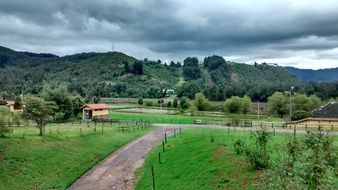 beautiful landscape of countryside against green hills