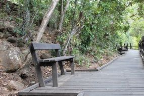 benches on the wooden floor in the park