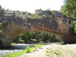 natural bridge in a forest