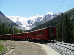 train with red wagons on the railway