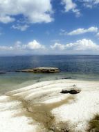 Yellowstone Lake on a background of beautiful clouds in Wyoming