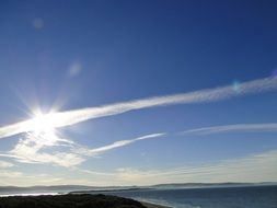 bright sun over the coast in spring