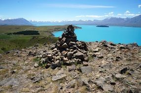 A pile of stones on a river bank