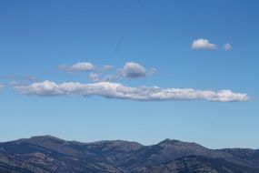White clouds and the mountains