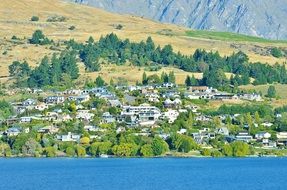 village near lake peaceful summer scenery
