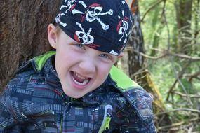 Happy boy in pirate hat