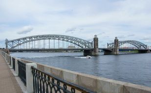 view from the embankment to the bridge over the river