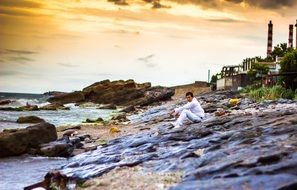 man in white in a seascape