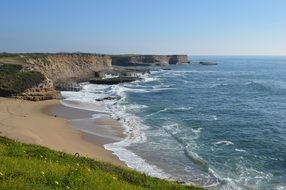 Sand ocean coast cliff sky view