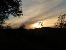 sunset over power lines