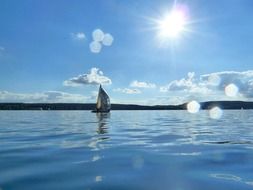 sailboat on lake constance under the bright sun