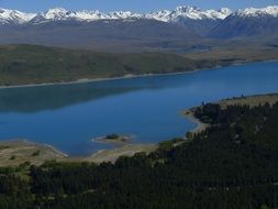 Southern Alps on the banks of the river in New Zealand