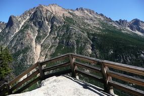 wooden fence at mountain cascades, usa, washington