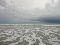 water on the beach on the island