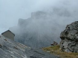 panorama of the swiss mountains in the clouds