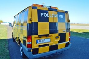 Yellow black lead vehicle