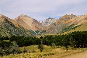 patagonia mountains with fields