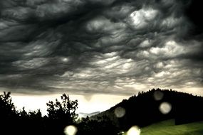 Terrific clouds over hills thunderstorm view