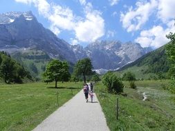 walking humans on a road