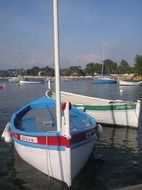 boats on a meditteranean sea bank in Italy