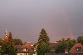 rainbow in the sky over the city