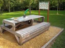 Wooden table and bench in a park