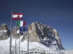 flags in dolomites mountain colorful scene