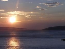 bright romantic sunset over the water
