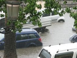 flooded street wish cars, italy, calabria