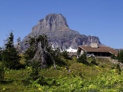 house on a background of cliff in Waterton Provincial Park