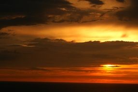 orange sky at sunset over the ocean