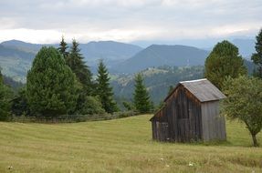 wooden shed on a mountainside in Ukraine