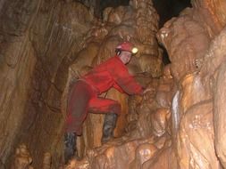 speleologist in a meteorite cave